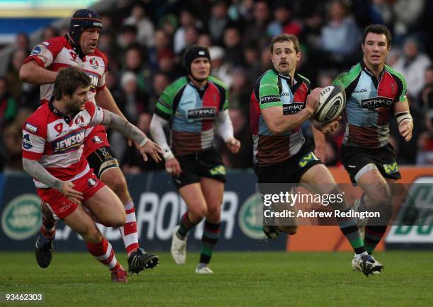 Nick Evans of Harlequins breaks through the Gloucester defence during the Guinness Premiership match between Harlequins and Gloucester at The Stoop...