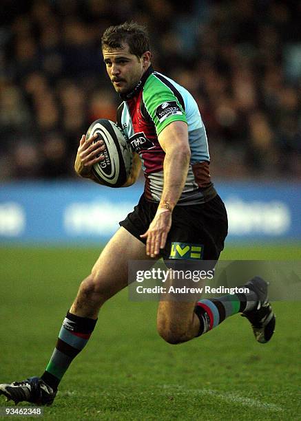 Nick Evans of Harlequins breaks through the Gloucester defence to score a try during the Guinness Premiership match between Harlequins and Gloucester...