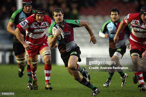 Nick Evans of Harlequins breaks through the Gloucester defence to score a try during the Guinness Premiership match between Harlequins and Gloucester...