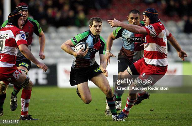 Nick Evans of Harlequins breaks through the Gloucester defence to score a try during the Guinness Premiership match between Harlequins and Gloucester...