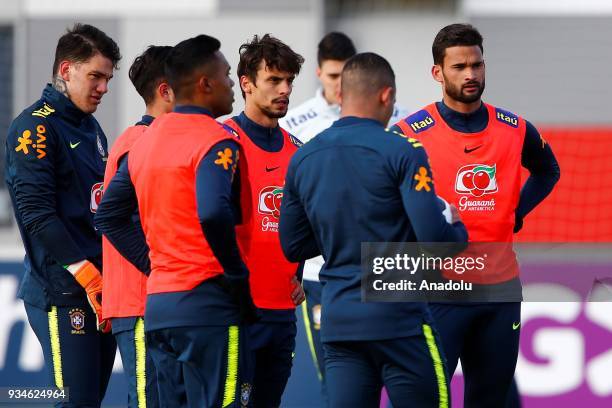 Ederson , Rodrigo Caio and Willian Jose are seen during a training session ahead of International Friendly Match between Russia and Brazil in Moscow,...