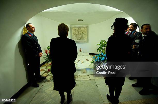 Chile's President Michelle Bachelet and Argentina's President Cristina Fernandez de Kirchner visit the tomb of Pope John Paul II on November 28, 2009...