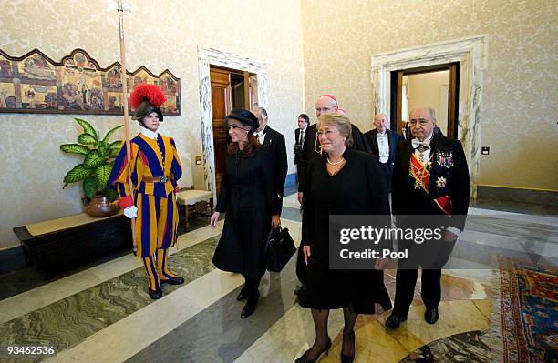 Chile's President Michelle Bachelet and Argentina's President Cristina Fernandez de Kirchner arrives to meet Pope Benedict XVI in his private library...