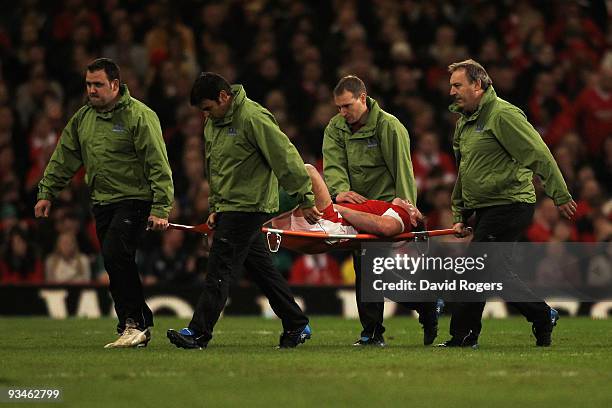 The injured Matthew Rees of Wales is stretchered off the pitch during the Invesco Perpetual Series match between Wales and Australia at the...