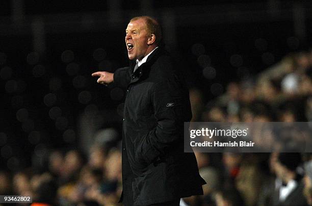 Gary Megson manager of Bolton instructs his team ahead of the Barclays Premier League match between Fulham and Bolton Wanderers at Craven Cottage on...