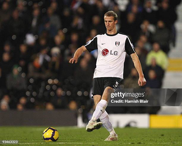 Brede Hangeland of Fulham in action during the Barclays Premier League match between Fulham and Bolton Wanderers at Craven Cottage on November 28,...