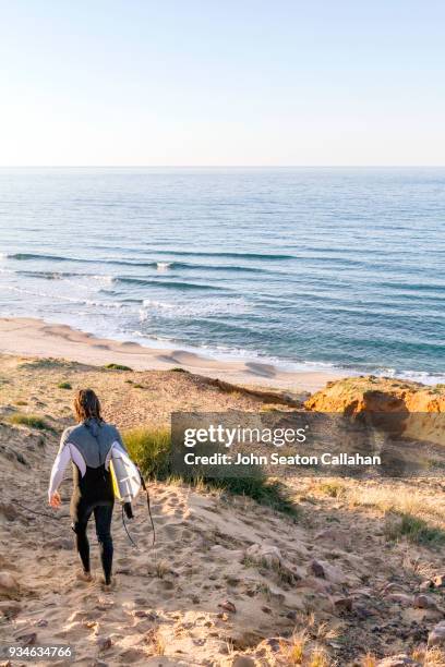 surfer on a sand dune - tunisia surfing one person stock pictures, royalty-free photos & images