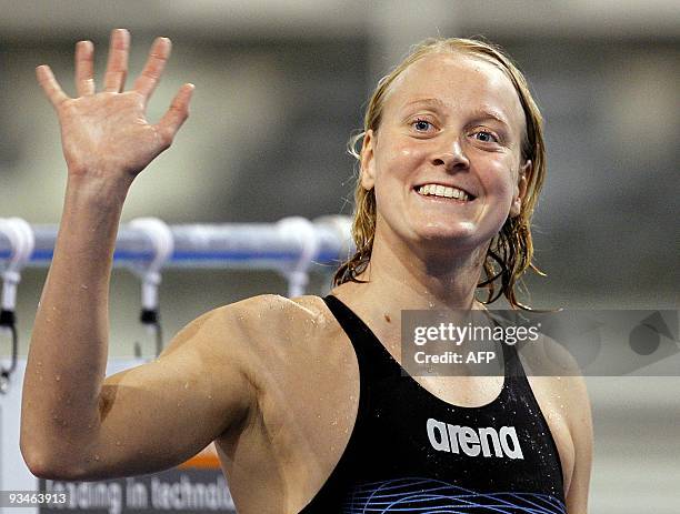 Dutch swimmer Inge Dekker celebrates her victory In the 50 metre during the Swimcup on November 28, 2009. AFP PHOTO / ANP ROBERT VOS Inge...