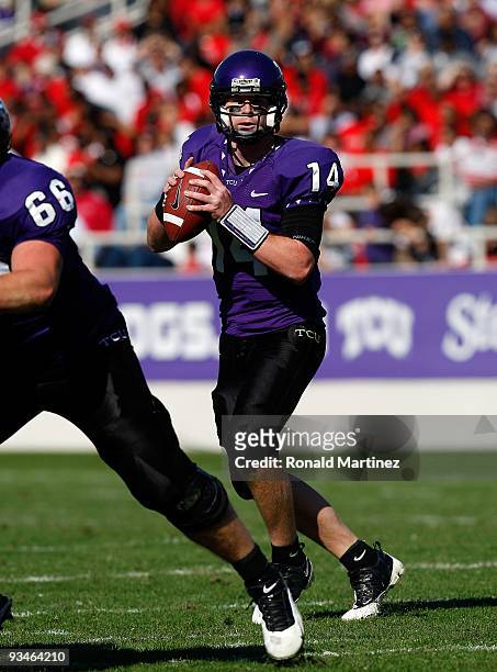 Quarterback Andy Dalton of the TCU Horned Frogs drops back to pass against the New Mexico Lobos at Amon G. Carter Stadium on November 28, 2009 in...