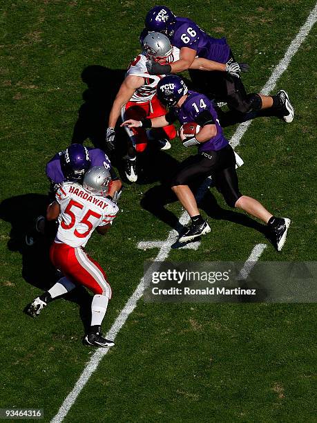 Quarterback Andy Dalton of the TCU Horned Frogs runs for a touchdown against the New Mexico Lobos at Amon G. Carter Stadium on November 28, 2009 in...