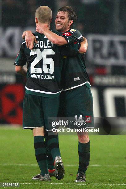 Michael Bradley of Moenchengladbach and Thorben Marx celebrate the 1-0 victory after during the Bundesliga match between Borussia Moenchengladbach...