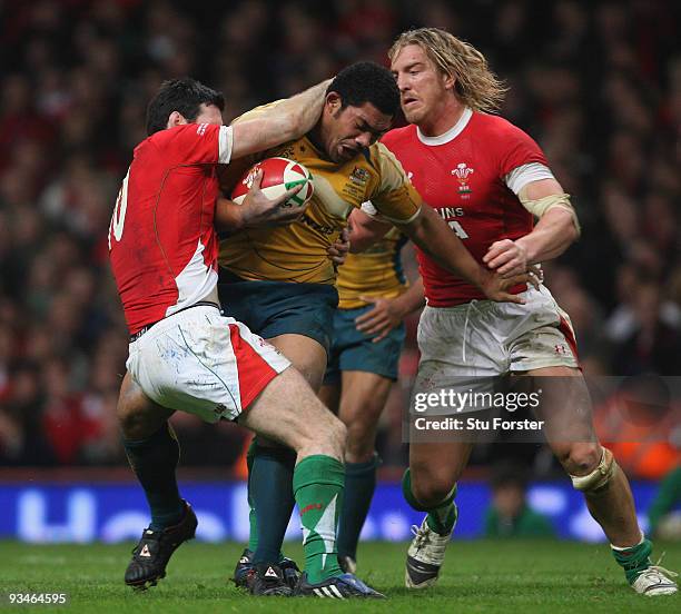 Wycliff Palu of Australia battles through the Wales defence during the Invesco Perpetual match between Wales and Australia at Millennium Stadium on...