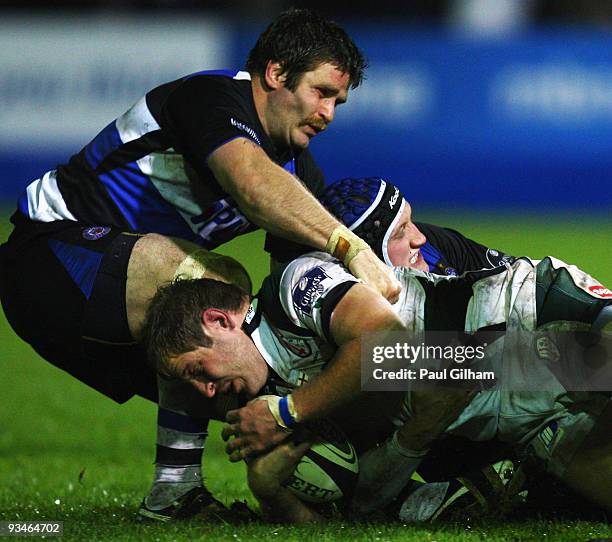 John Rudd of London Irish is tackled by Luke Watson of Bath during the Guinness Premiership match between Bath Rugby and London Irish at The...