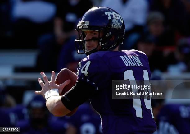 Quarterback Andy Dalton of the TCU Horned Frogs drops back to pass against the New Mexico Lobos at Amon G. Carter Stadium on November 28, 2009 in...