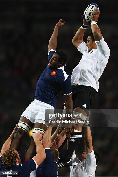 Jerome Kaino of New Zealand climbs above Fulgence Quedraogo at a line out during the France v New Zealand International match at the Stade Velodrome...