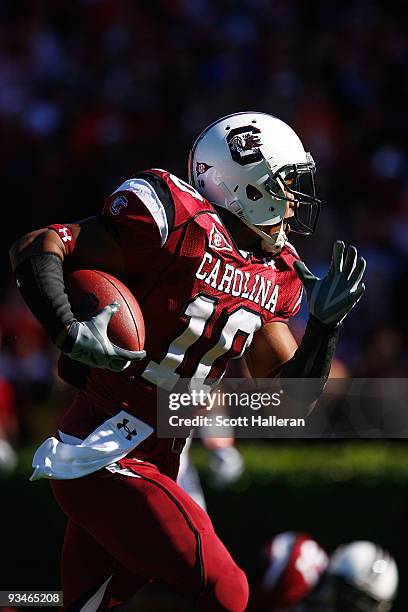 Brian Maddox of the South Carolina Gamecocks runs for a first half touchdown against the Clemson Tigers at Williams-Brice Stadium on November 28,...