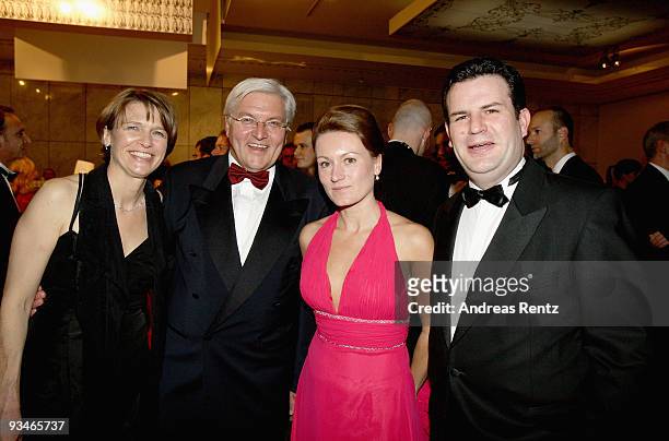 German politicians Frank-Walter Steinmeier with his wife Elke Buedenbender and Hubertus Heil with his wife Solveig Orlowski attend the annual press...