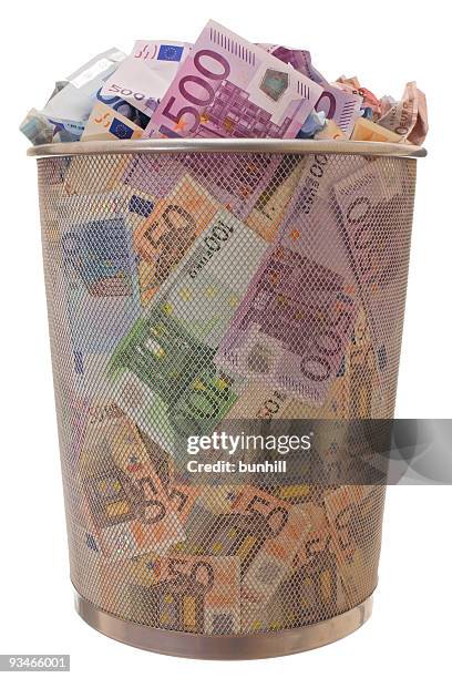 euro € trash bin - eu euro economy trashcan concept - euros and trash stockfoto's en -beelden