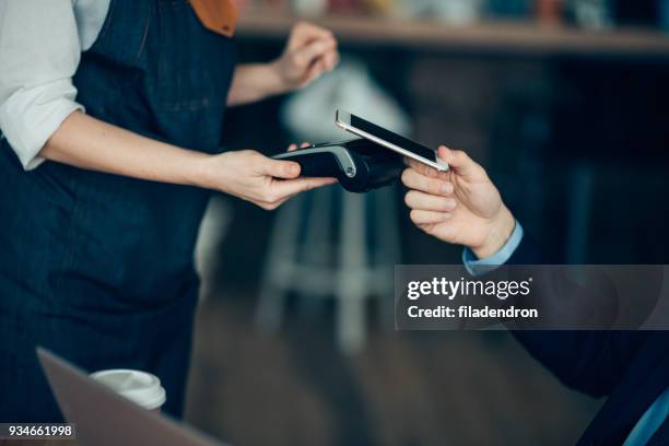 contactless smartphone payment - mobile payment stock pictures, royalty-free photos & images