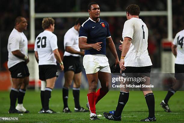 Thierry Dusautoir the France captain shakes hands with Tony Woodcock after his side's 12-39 defeat during the international match against New Zealand...