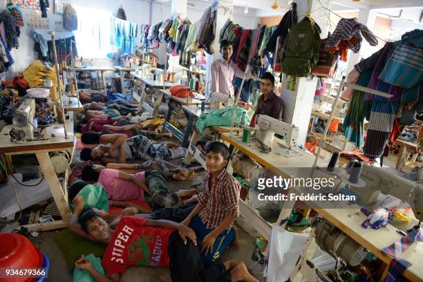 The capital city of Dhaka. Small textile factory in the city of Dhaka where employees work 24 hours a day. Dhaka is the capital of Bangladesh June...
