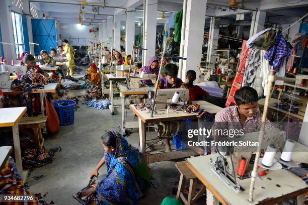 The capital city of Dhaka. Small textile factory in the city of Dhaka where employees work 24 hours a day. Dhaka is the capital of Bangladesh June...