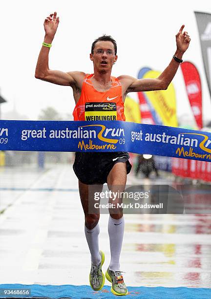 Guenther Weidlinger of Austria crosses the finish line to win the Elite male section during the Australian Road Running Championships and Great...