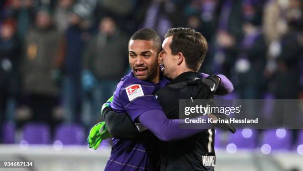 Malcolm Cacutalua and Goalkeeper Martin Maennel of Aue celebrate the victory during the second Bundesliga match between FC Erzgebirge Aue and SpVgg...