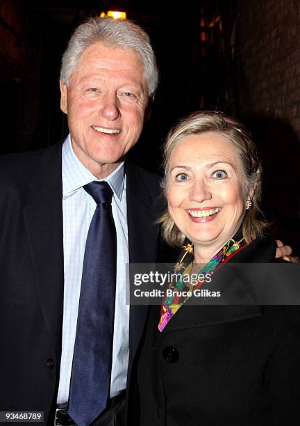 Bill Clinton and Hillary Clinton pose backstage at "39 Steps" on Broadway at The Helen Hayes Theater on November 28, 2009 in New York City.