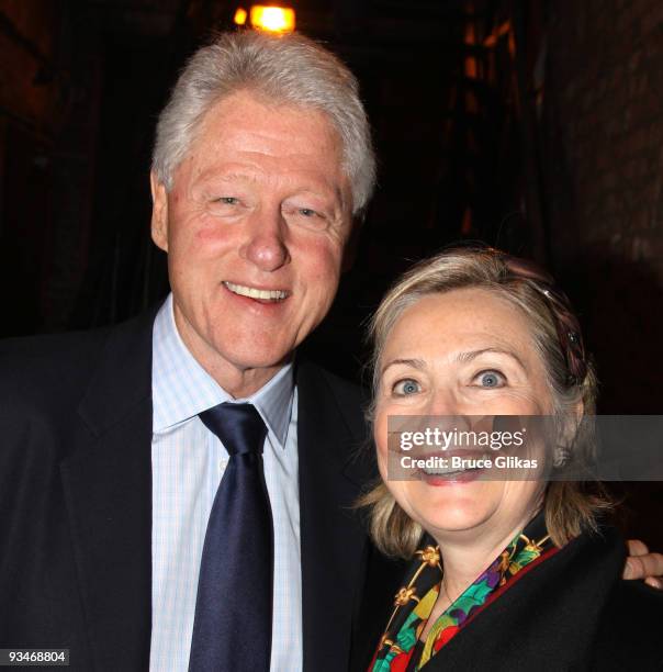 Bill Clinton and Hillary Clinton pose backstage at "39 Steps" on Broadway at The Helen Hayes Theater on November 28, 2009 in New York City.