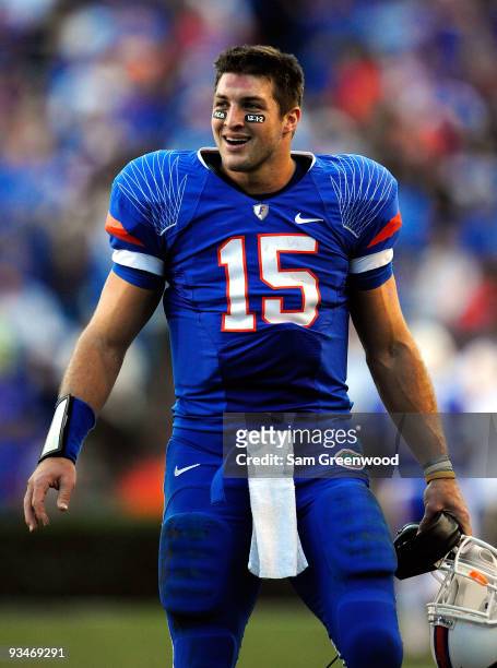 Tim Tebow of the Florida Gators smiles after a defensive stop during the game against the Florida State Seminoles at Ben Hill Griffin Stadium on...