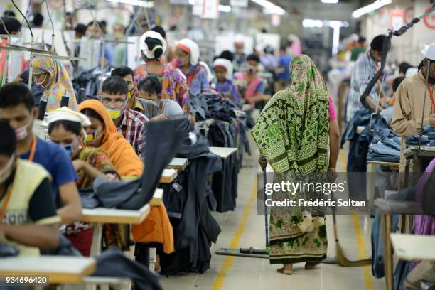 The capital city of Dhaka. Textile factory in Savar, in the suburbs of Dhaka where work about six thousands employees. Dhaka is the capital of...