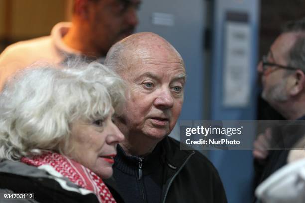 French political activist Olivia Zemor accompanied by Former French bishop Jacques Gaillot waits in the court of Versailles, near Paris on March 19,...