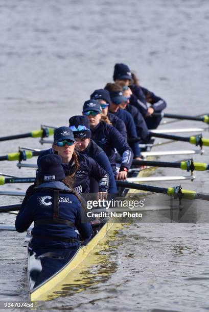 Oxford and Cambridge's women and men teams are seen during a training session in te area of Putney, London on March 19, 2018. The Boat Races will see...