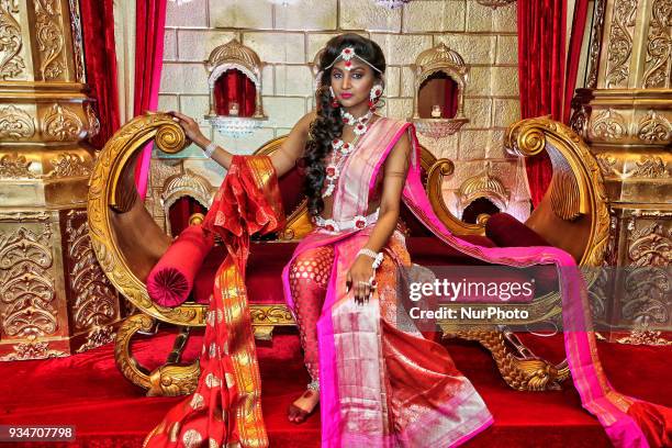 Model dressed in an elegant outfit to resemble the beautiful Indian queen Amrapali during the Amrapali 2018 fashion exhibition held in Markham,...