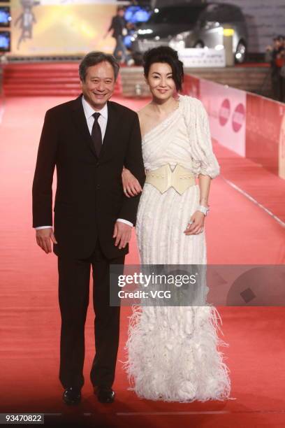 Director Ang Lee and actress Maggie Cheung arrive at the red carpet of the 46th Golden Horse Award at the Amazing Hall on November 28, 2009 in...