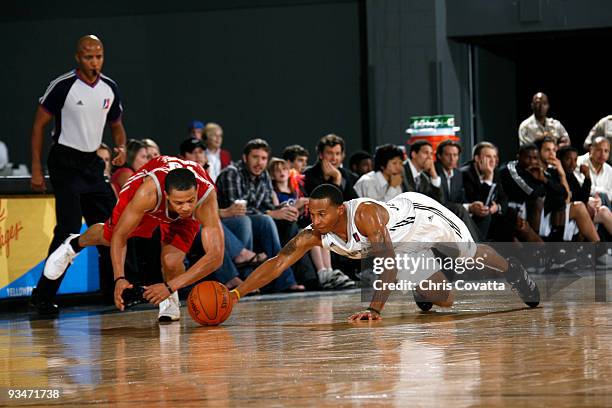 Curtis Jerrells of the Austin Toros battles Jonathan Wallace of the Rio Grande Valley Vipers on November 28, 2009 at the Austin Convention Center in...