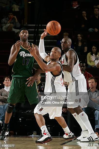 Sundiata Gaines and Anthony Tolliver of the Idaho Stampede look after a pass from Rod Benson of the Reno Bighorns at Qwest Arena on November 28, 2009...