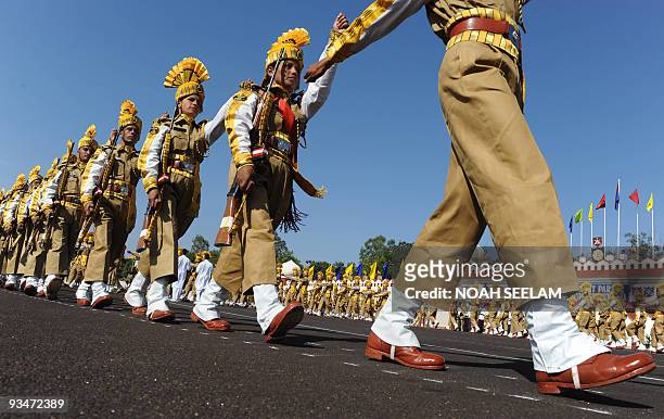 Members of the Central Industrial Security Force march during the passing out parade of some 335 Sub-Inspector trainees at the National Industrial...
