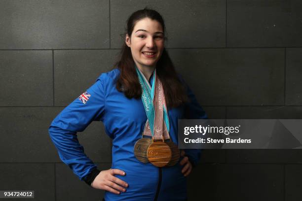 Medalist Menna Fitzpatrick poses with her respective medals as Team ParalympicsGB arrive back from the PyeongChang 2018 Paralympic Winter Games at...