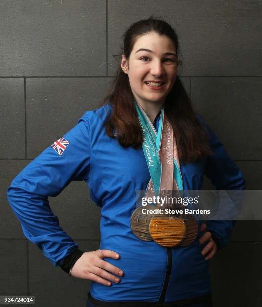 Medalist Menna Fitzpatrick poses with her respective medals as Team ParalympicsGB arrive back from the PyeongChang 2018 Paralympic Winter Games at...