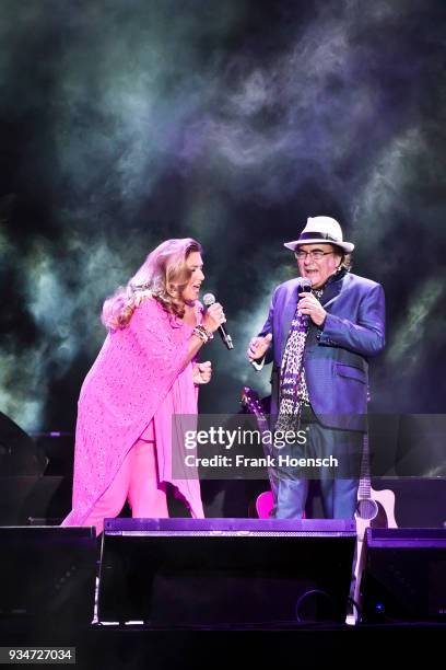 Singer Romina Power and Al Bano perform live on stage during a concert at the Mercedes-Benz Arena on March 19, 2018 in Berlin, Germany.