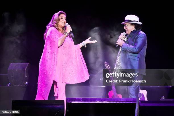 Singer Romina Power and Al Bano perform live on stage during a concert at the Mercedes-Benz Arena on March 19, 2018 in Berlin, Germany.