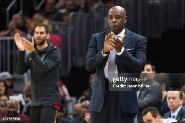 Interim head coach Larry Drew of the Cleveland Cavaliers celebrates his team during the first half against the Milwaukee Bucks at Quicken Loans Arena...