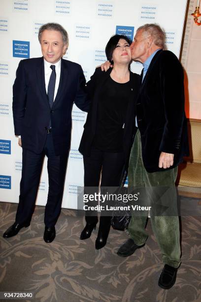 Presenter Michel Drucker, Singer Liane Foly and TV Presenter Patrick Poivre D'Arvor attend " Les Stethos D'Or 2018" Gala at Four Seasons Hotel George...