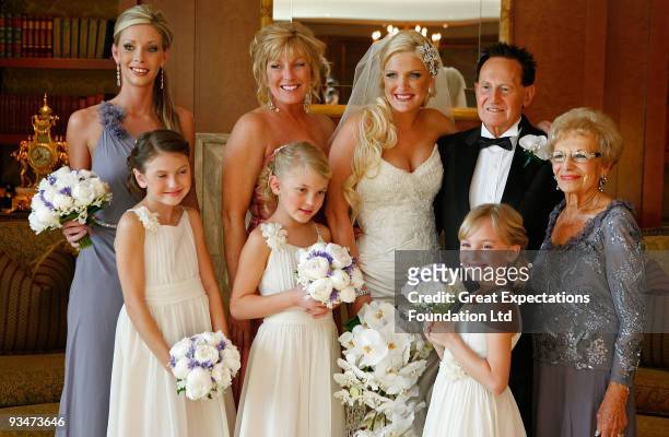 Bride Brynne Gordon and groom Geoffrey Edelsten pose for a photograph with maid of honour Katie Eagle , mother of the bride Mariela Gordon , flower...