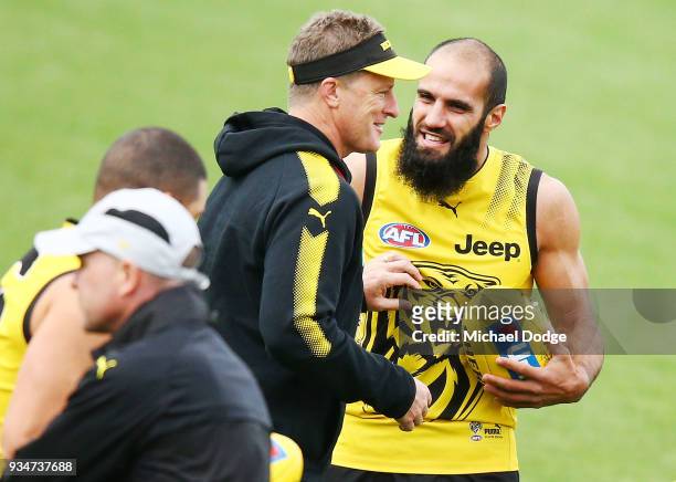 Bachar Houli reacts to Tigers head coach Damien Hardwick sprints during a Richmond Tigers AFL training session at Punt Road Oval on March 20, 2018 in...