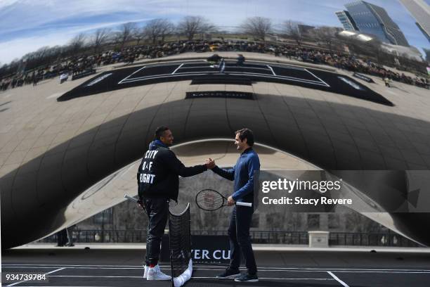 Nick Kyrgios of Australia and Roger Federer of Switzerland pose at Cloud Gate before the Laver Cup 2018 Chicago Launch on March 19, 2018 in Chicago,...
