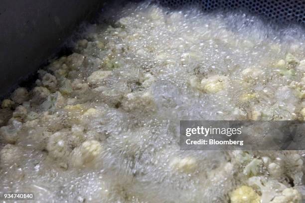 Pieces of cauliflower are washed prior to packaging at a warehouse of Bigbasket, an e-grocer operated by Supermarket Grocery Supplies Pvt, in...