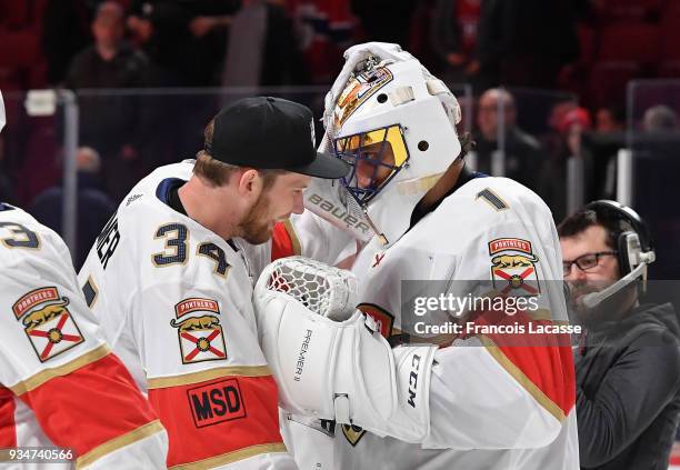 James Reimer celebrates with Roberto Luongo of the Florida Panthers after defeating the Montreal Canadiens in the NHL game at the Bell Centre on...